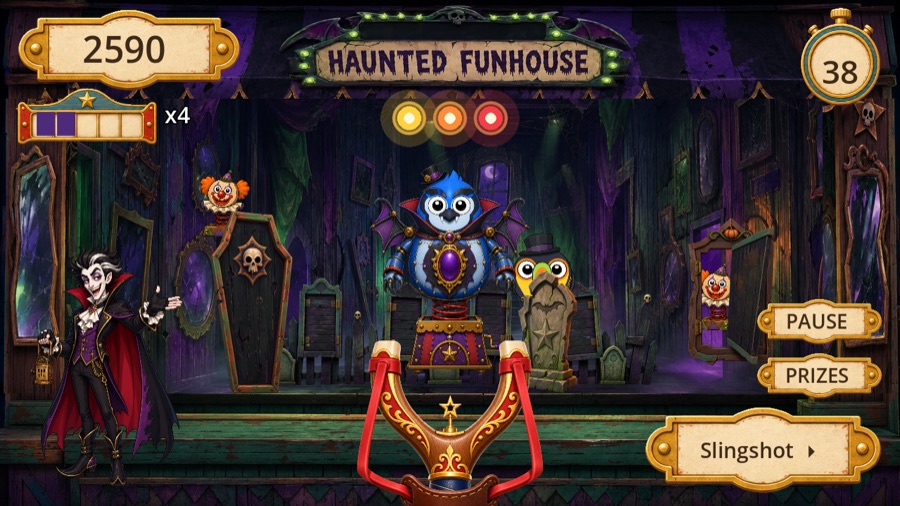 the Haunted Funhouse booth, ghoulish props and pop-up targets